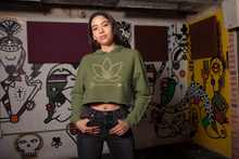 Load image into Gallery viewer, Latina woman in army green crop hoodie with Lotus Noir logo in center