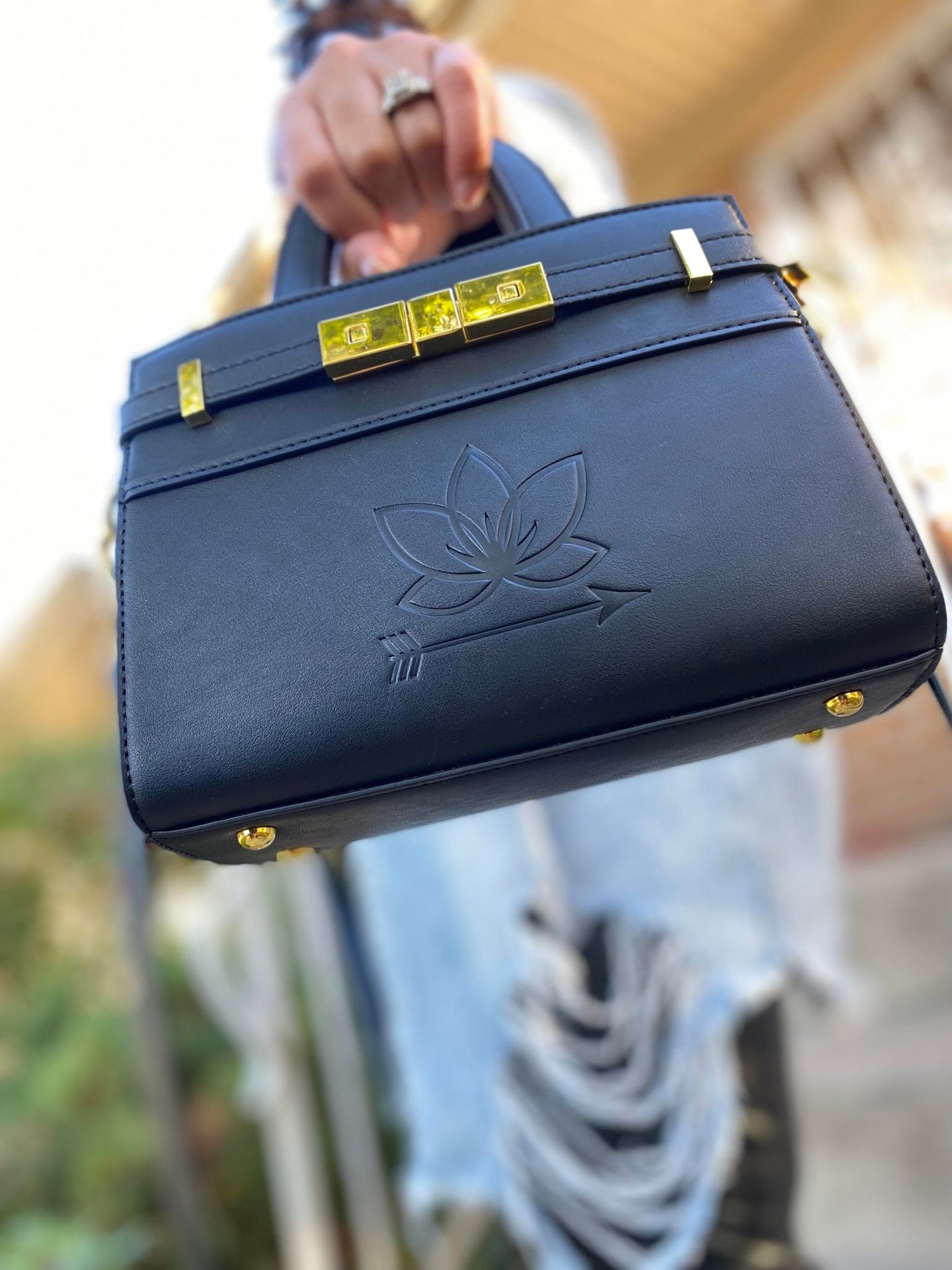 black vegan leather sling purse